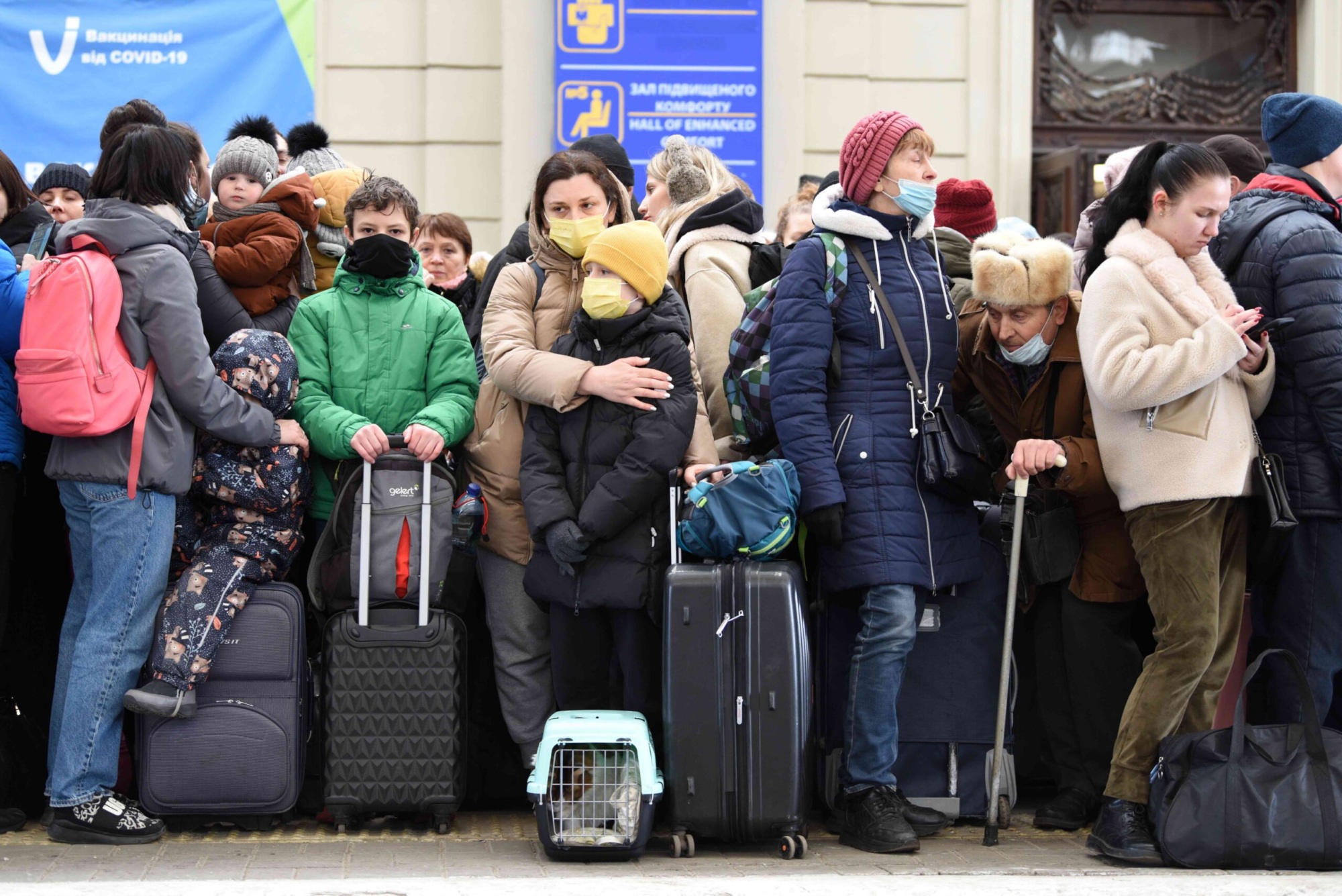 People in railway station of western Ukrainian city of Lviv waiting for the train to Poland.