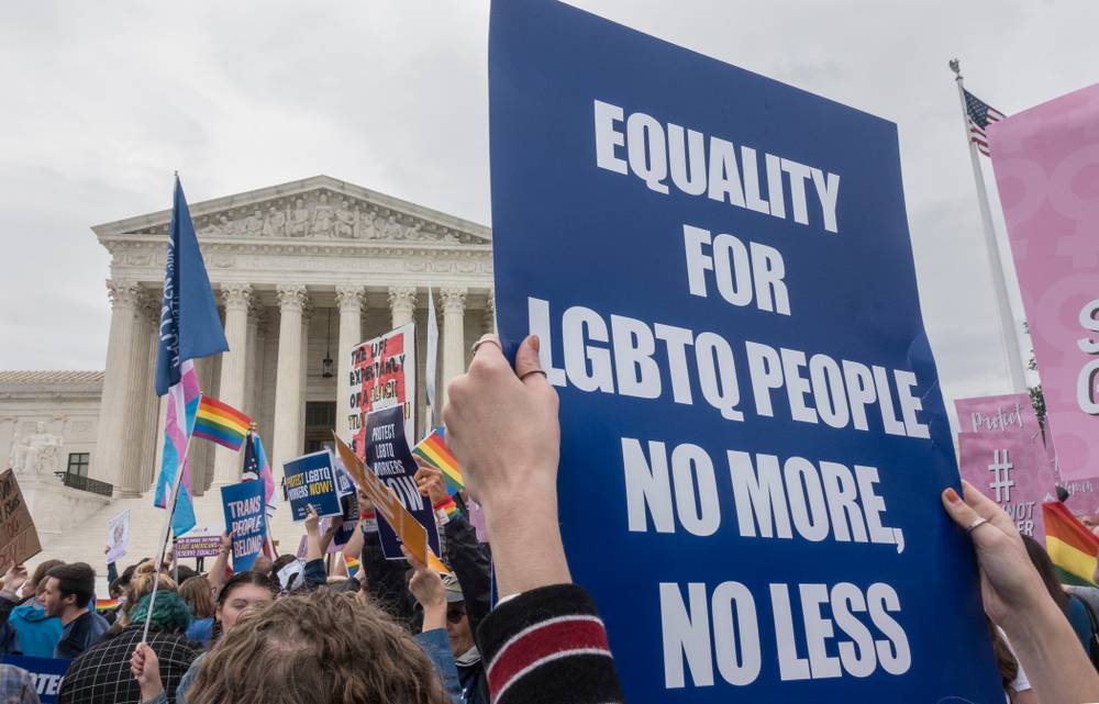 Sign outside Supreme Court reads: "Equality for LGBTQ People, No More, No Less"