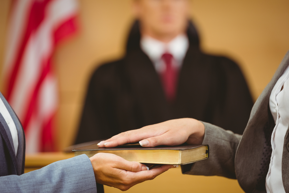 Swearing on a Bible before a judge